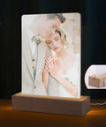 5 By 7 Inch Sublimation Ready Heart Shape LED Acrylic Photo Frames Set on wooden stand with cozy night light display