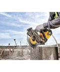 Flexvolt 9 Inch Diamond Cutting Wheel For Masonry And Concrete With Seven Eighths Inch Arbor 6600 Max RPM in use cutting block