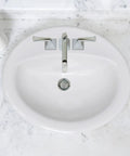 Top Shelf White Ceramic Drop In Bathroom Sink 20 Inch Single Bowl Vanity Washbasin Self Rimming with faucet on marble countertop.