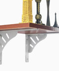 2 Pack Heavy Duty Floating Shelf Brackets Stainless Steel Wall Mount Corner Supports With Screws Rugged Triangle Design holding a wooden shelf with decorative items.