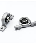 Heavy Duty Zinc Alloy Pillow Block Bearing Self Aligning Unit Fits Shafts 8 10 12 15 17 20 Mm Low Noise Runs Like A Dream Handles Heavy Loads Daily Use Keeps Rig Moving Smooth Without Getting Stuck On Tough Jobs Always Performs Better Than Best. 12mm bore pillow block bearing with cast iron housing