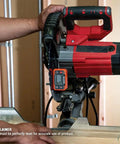 Digital Level And Angle Gauge With LED Alert And Angle Setter measuring angle on red power tool in workshop