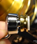 Close-up of Nexave Fi Line Roller Bearing Upgrade Kit for 21 Nexave Fishing Reels showing metal and gold roller components.