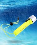 Underwater Dive Light 180LM LED Flashlight For Scuba, Snorkeling, And Outdoor Adventures floating in water with yellow aluminum body
