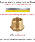 One Half Inch NPT Male To Three Eighth Inch NPT Female Beefy Brass Hex Bushing Reducer Adapter with ruler for size reference