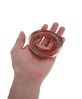 Straight Up Pure Copper Welding Strips For Ev Battery Packs And Power Modules Smooth Thin Copper Metal Roll in hand.