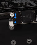 Close-up of 46 Pieces NVMe M.2 SSD Mounting Screws Kit with magnetic screwdriver securing M.2 drive to motherboard