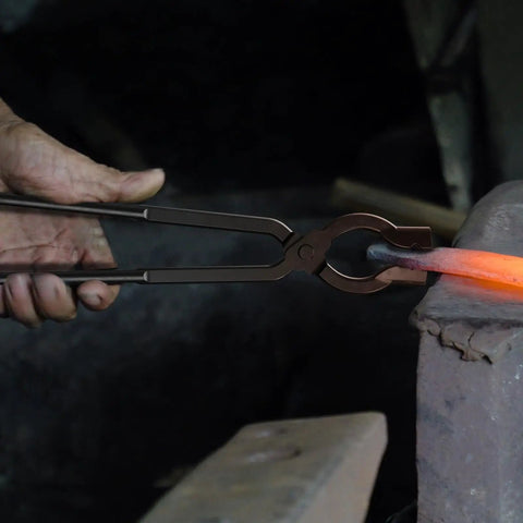 Hardcore Blacksmith Tongs Set 17 Inch Carbon Steel Forging Tongs in use on hot metal, showing durable hot forged performance.