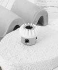 Two Piece Sewing Machine Vertical Top Shaft Bevel Gear Replacement Kit 155819 for Singer 247-478 on white surface