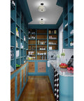 Two-Light Semi-Flush Ceiling Light In Black Finish From Inspire Collection installed in modern kitchen, visible above counter