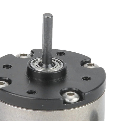 Close-up of planetary gearbox reduction motor output shaft for RC cars and trucks.