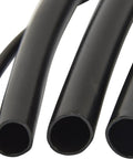 Close-up of Quarter Inch Drip Irrigation Tubing, 100 Foot Black Polyethylene Supply Line, showing different diameters and thickness.