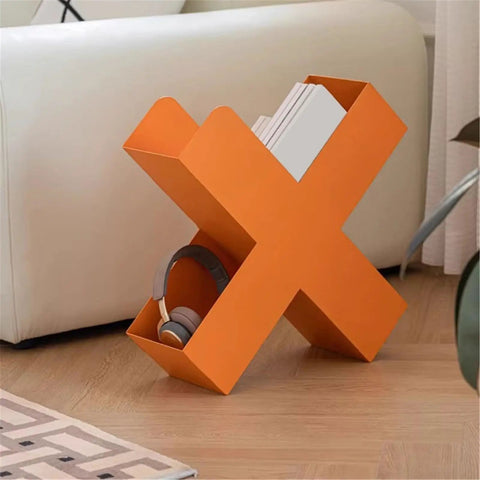 Dope Geometric Iron Floor Bookshelf With Nordic Vibe in orange, holding books and headphones, multi-angle metal organizer display.