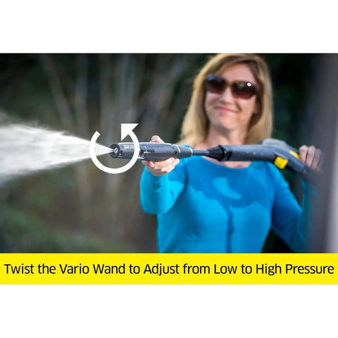 Compact 1600 PSI Electric Pressure Washer with Vario and Dirt Blaster Spray Wands in use outdoors