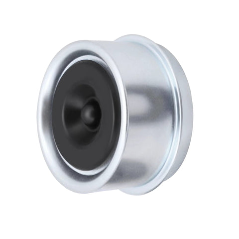Close-up of a silver metal trailer wheel hub dust cover with a black inner seal
