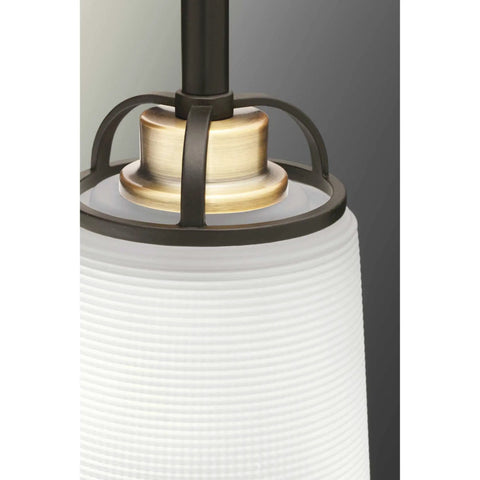 Detail of West Village Bath And Vanity Light Fixture in Antique Bronze, Modern Industrial Style with prismatic glass shade