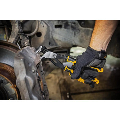 Pitbull Dual Material Pliers Set Six Piece Built Tough With High Leverage Joint Design in use on car brake caliper