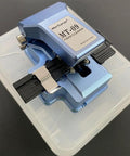 Boss Level Mt 09 Fiber Cleaver Automatic Cable Cutting Knife For Ftth Installations, blue steel tool with precise cutting features.