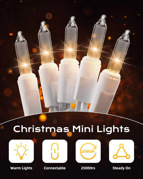 Clear Incandescent Mini Christmas Lights 100-Count On 20 Ft White Wire End-To-End Connectable 2.4 Inch Bulbs close-up