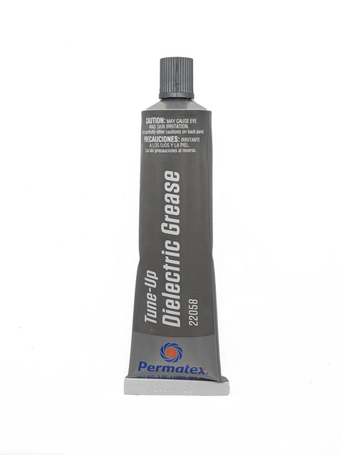 Front view of gray squeeze-tube Permatex dielectric tune-up grease, 3 oz, with blue Permatex logo