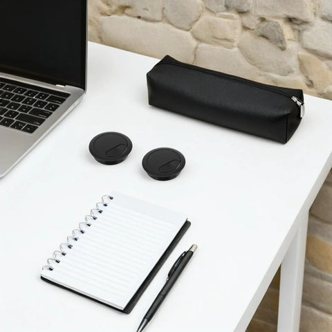 Get Your Desk Totally Clean With This 20 Pcs Cable Grommet Kit For Home And Office Use. Made From Sturdy Black Abs Plastic, These Easy Install Wire Organizers Keep Cables Outta Sight And Make Cleaning A Breeze While You Tackle Any Project In Style. black ABS cable grommets on white desk beside laptop