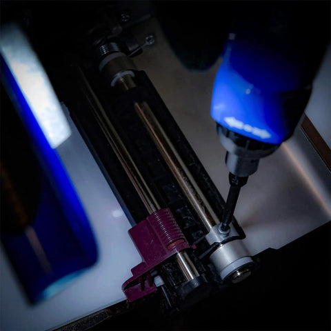 Close-up of blue drill using 11 Piece Hex Allen Power Bit Set With Magnetic Tips And Quick Release Shanks For Drills And Impact Drivers
