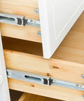 Sturdy Stainless Steel Drawer Slide Rail Set With White Plastic Glides installed in wooden cabinet drawer.