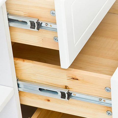Sturdy Stainless Steel Drawer Slide Rail Set With White Plastic Glides installed in wooden cabinet drawer.