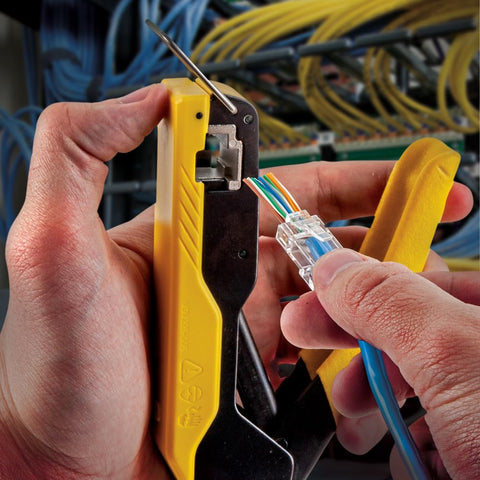 Close-up of RJ45 Ethernet Cable Tester And Crimper Kit With Pass Thru Technology in use for Cat5e and Cat6 terminations.