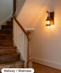 Two Pack Rustic Wood Wall Sconces Set Vintage Farmhouse Style Light Fixtures illuminating a wooden staircase with warm cozy glow