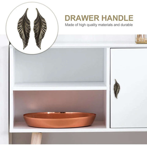 Antique Zinc Alloy Leaf Cabinet Handle Set displayed on a white cupboard, vintage style leaf drawer pulls, retro home furniture hardware