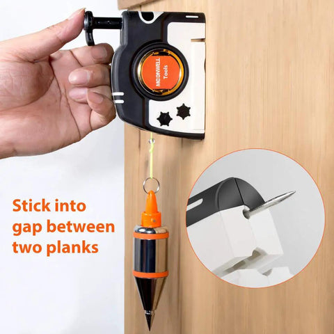 Hand using Pro Plumb Bob With Auto Retracting String 8m 26ft Nylon Cord 15oz Weight on wooden plank for leveling