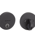 Front and side view of Uptown Matte Black Single Cylinder Deadbolt Lock For Exterior Front Doors With Keyed Entry And Pick Resistant SmartKey Rekey Security Plus Microban Protection Rock Solid Outdoor Use