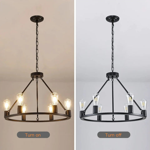 Industrial Black Wagon Wheel Chandelier With Six Candle Style Lights Dope Farmhouse Vibe Ceiling Fixture light on and off view