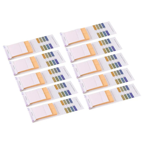 PH Test Strips 8.2 To 10.0 Indicator Paper Litmus Tester 80 In 1 Kit laid out with color charts