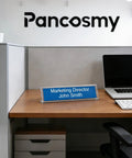 Clear Acrylic Desk Name Plates 12 Pack With Horizontal Slant Back 2x8 Sign Holders on office desk