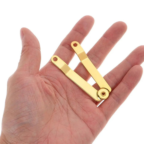 Golden Iron Lid Support Hinges For Jewelry Box And Treasure Chest With Sleek Design And Easy Mounting shown in hand
