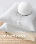 Pack of 2 16x16 Inch Outdoor Pillow Inserts Waterproof Decorative Throw Pillow Forms Square Lumbar Garden Cushions for Patio Sofa Couch Durable 380g High Density Fiber Fill for Plush Comfort - close-up view of fluffy white pillow inserts stacked with a ball on top.