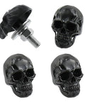 Badass Skull License Plate Screws And Motorcycle Plate Bolts Featuring Four Piece Black Fastener Set. 4 black skull bolts with chrome detail.