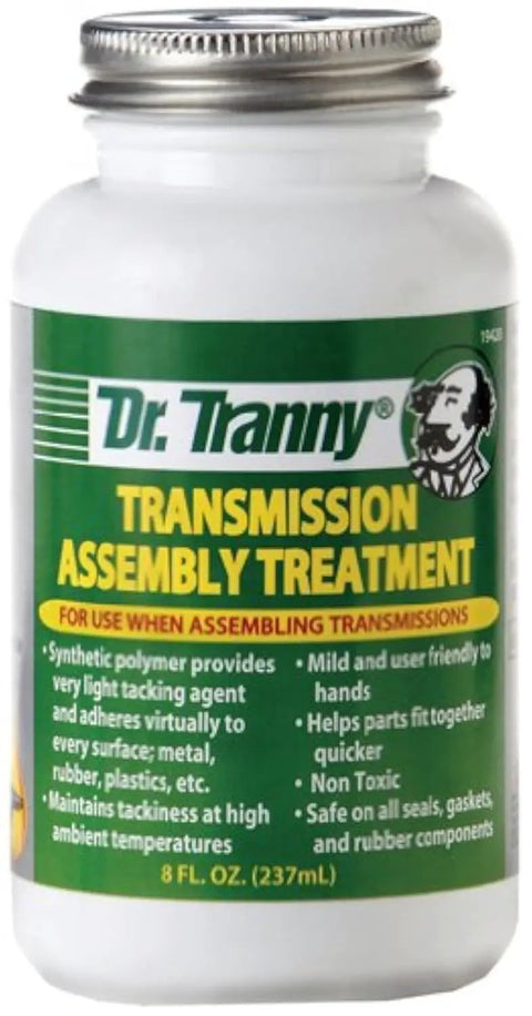 Bottle of Dr Tranny Transmission Assembly Treatment 8 Oz Clear Polymer With Light Tack Bonds To Metal Rubber Plastic