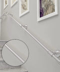 Tough As Nails 16 Foot Stair Handrail Indoors And Outdoors Rust Resistant Wrought Iron Safety Bar on gray wall with steps.