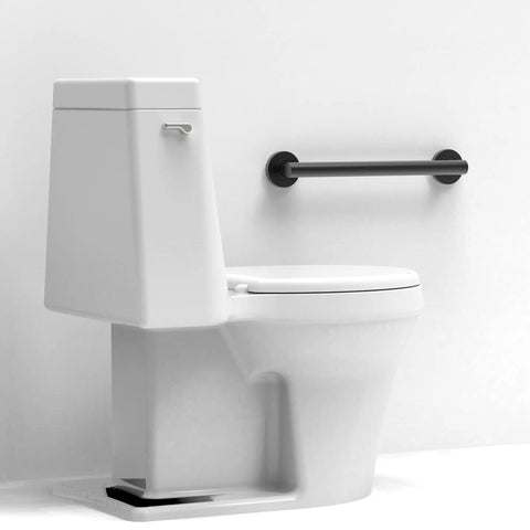 Glacier Collection 16 Inch Stainless Steel Bath Grab Bar Designer Safety Bar Matte Black Sleek Design ADA Compliant 500 Lb Load Capacity For Shower Or Tub Non Slip Comfort Grip And Easy Mount Durable Finish Built To Last mounted next to a toilet in a white bathroom.