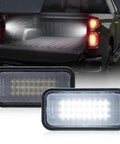 LED Truck Bed Light For Chevy Silverado And GMC Sierra 2019 To 2026 White Rear Cargo Area Lamp OEM Replacement Fits 1500 2500HD 3500HD Trucks Easy Plug In Lighting Upgrade Must Have image showing two LED lights and truck bed in background