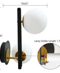 Black And Gold Globe Wall Sconce Set Two Light Fixture In Mid Mod Style Brass And Black Finish With Milk Glass Globes Ideal Wall Lighting For Bathroom Bedroom Hallway And Living Areas, showing detailed dimensions and angles.