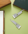 Go-To 2 Pack Stainless Steel Beekeeping Hive Tools Set on a green surface, including a hive scraper and frame lifter