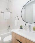 Modern bathroom with brushed nickel towel rack set, featuring a wall-mounted SUS304 stainless steel dope durable towel bar.