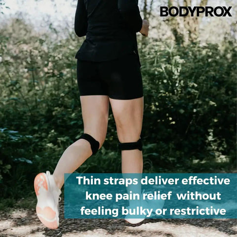 Runner wearing Patella Tendon Knee Strap 2 Pack, Adjustable Knee Support Brace For Pain Relief in outdoor setting.