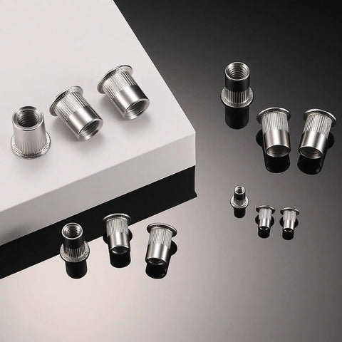 60Pcs M6 Stainless Steel Rivet Nuts Kit Flat Head Rivnut Threaded Inserts Nutsert Rivet Nut With Knurled Body displayed on surface