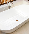 Grippy Non Slip Bathtub And Shower Stickers Set 24 Pieces 8 By 0.8 Inch Anti Skid Treads in white bathtub.
