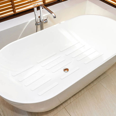 Grippy Non Slip Bathtub And Shower Stickers Set 24 Pieces 8 By 0.8 Inch Anti Skid Treads in white bathtub.